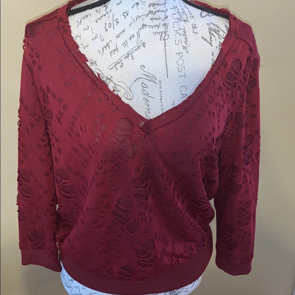 Allen B distressed blouse.